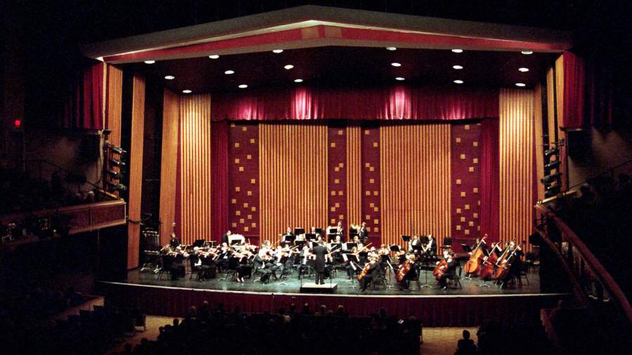 orchestra playing on stage