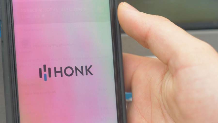 The Honk App is shown on a phone. 